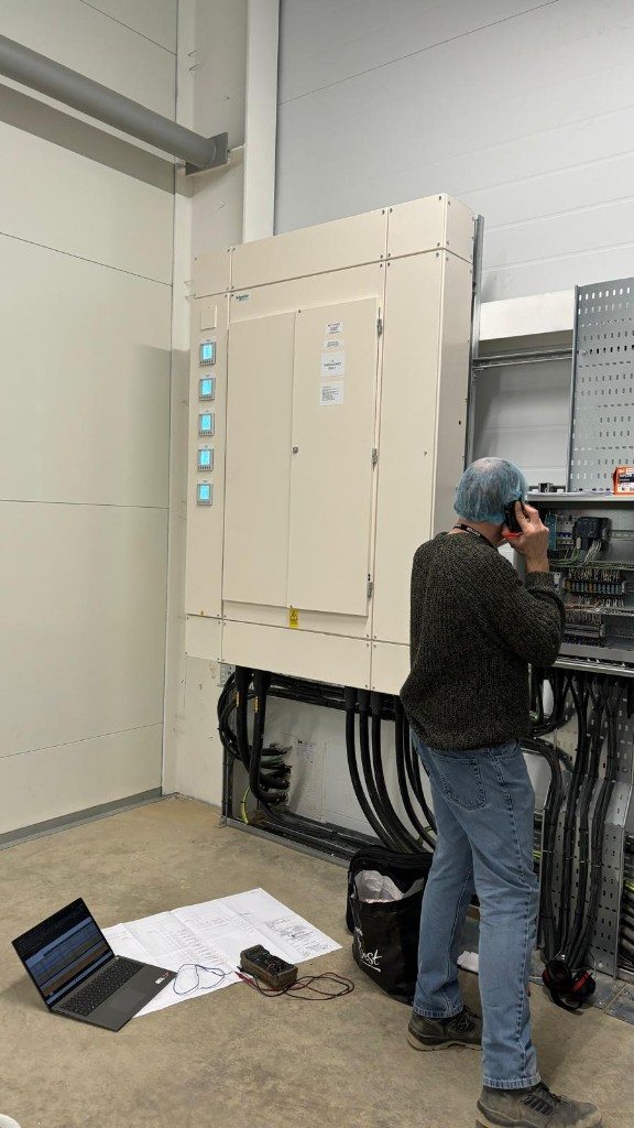 Engineer carrying out switchgear commissioning works