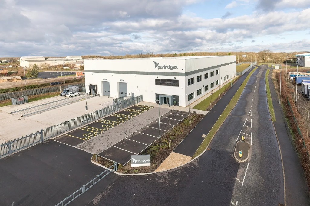 Completed commercial building supported by full NEC power infrastructure package